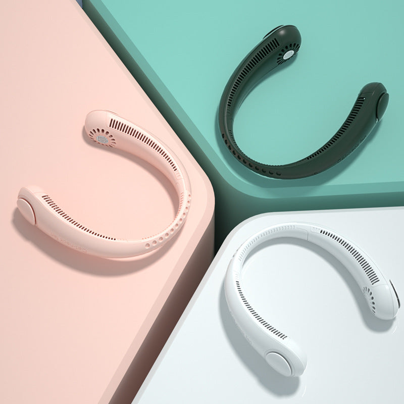 Three neck straps in pink, black, and white on a colorful background